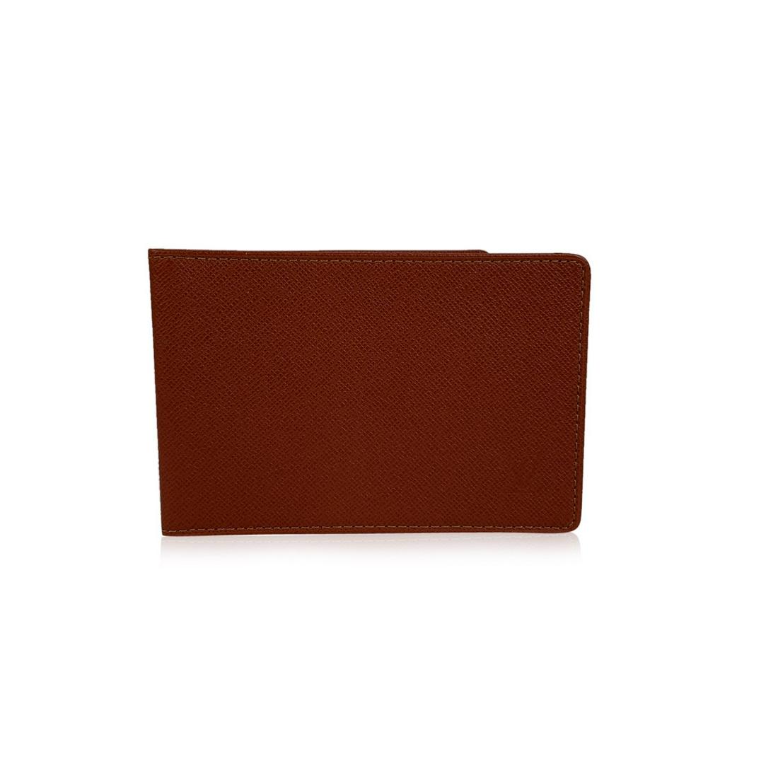 Louis Vuitton Light Brown Tan Taiga Leather ID Document: Louis Vuitton Light Brown Tan Taiga Leather Bifold ID Document Holder with 2 slots inside with platis windows. LV - LOUIS VUITTON monogram embossed on leather on the front 'LOUIS VUITTON Paris - Made