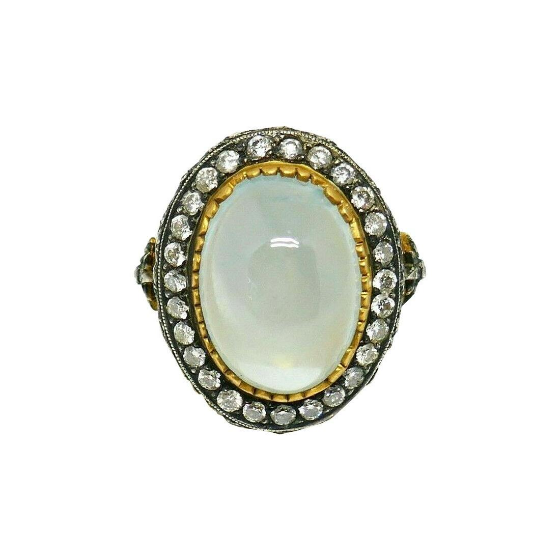 Stephen Webster Opal Yellow Gold Sterling Silver: Gorgeous opal ring by Stephen Webster made of 18k yellow gold featuring sterling silver decorative elements. Gold has a matte finish. Ring size is 6 (sizable). Stamped with the Stephen Webster maker's