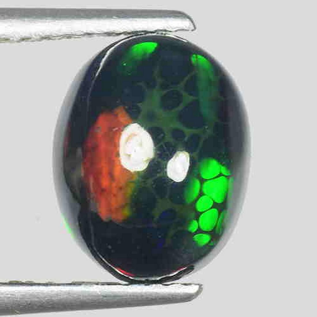 1.60cts PREMIUM TOP!RAINBOW Pattern. Extreme Color Play: Title: 1.60cts PREMIUM TOP!RAINBOW Pattern. Extreme Color Play BLACK Welo Opal OP432 Carat Weights: 1.6 Size/Dimensions: 9.80x7.60x4.60MM Additional Information: HEATED Reserve: $25.00 Shipping: Domes