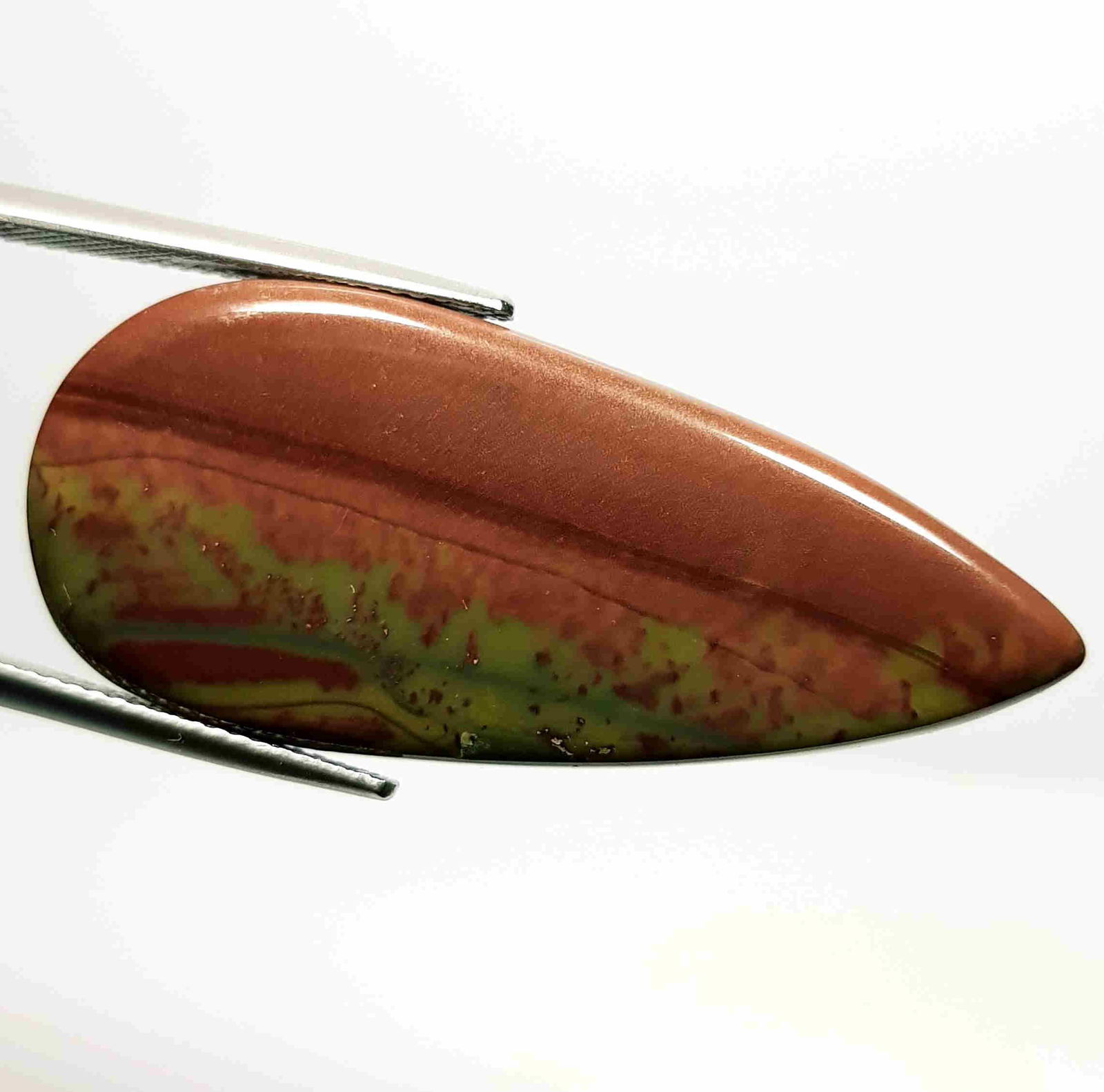 34.68 ct Natural Imperial Jasper: No Reserve! Title: 34.68 ct Natural Imperial Jasper Color/Clarity: Opaque Gemstones: Gemstones Carat Weights: 34.68 Size/Dimensions: 40.30 x 17.70 x 6.20 Additional Information: Pear - Brazil Shipping