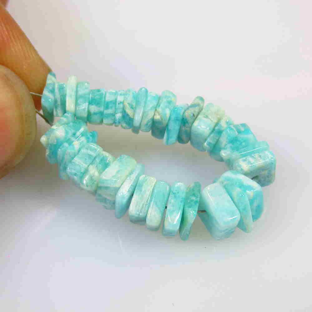 20.00 Ctw Natural 34 Drilled Amazonite Square Beads: No Reserve! Title: 20.00 Ctw Natural 34 Drilled Amazonite Square Beads Stone Clarity: Opaque Gemstone: Amazonite Beads Carat Weight: 20.00 Size/Dimensions: 4.8x4.8 to 6.0x6.0 mm / 34 PC's Additional I