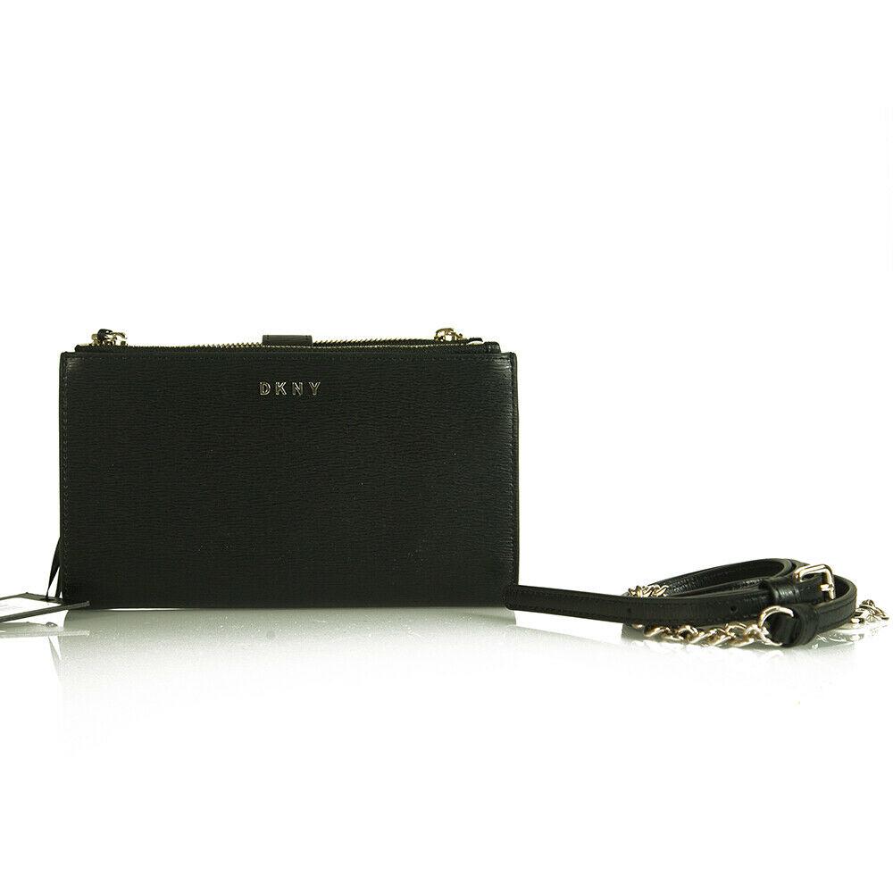 DKNY Donna Karan Bryant - Park Black Leather Wallet: DKNY Donna Karan Bryant - Park Black Leather Wallet Shoulder Bag Crossbody When you're traveling light, there's no better way to do it than with the DKNY Bryant Logo Wallet Crossbody. A magnificent pi
