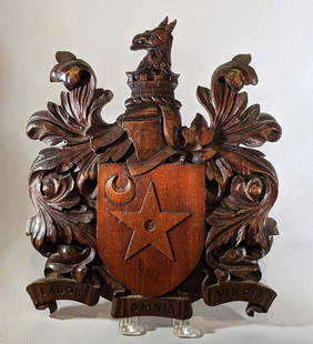 City of Wolverhampton 19th c. Carved Shield /: Title: City of Wolverhampton 19th c. Carved Shield / Coat-of-ArmsDimension: 12" H x 10" WAdditional Information: Carved Coat of Arms - City of Wolverhampton. The shield is with a bold star & crescent