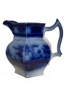 Flow Blue Milk Pitcher: Title: Flow Blue Milk PitcherDimensions: 6"Provenance/Additional Info:A Flow Blue milk pitcher in excellent condition. It is of the AMOY pattern by Davenport. Shipping:Domestic: Flat-rate of $20.00