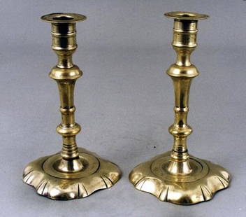 A good small pair of English brass ruffled base: Title: A good small pair of English brass ruffled base candlesticksDate: c. 1740Dimensions: 7 1/4" H Shipping:Domestic: Flat-rate of $25.00 to anywhere within the contiguous U.S.International: