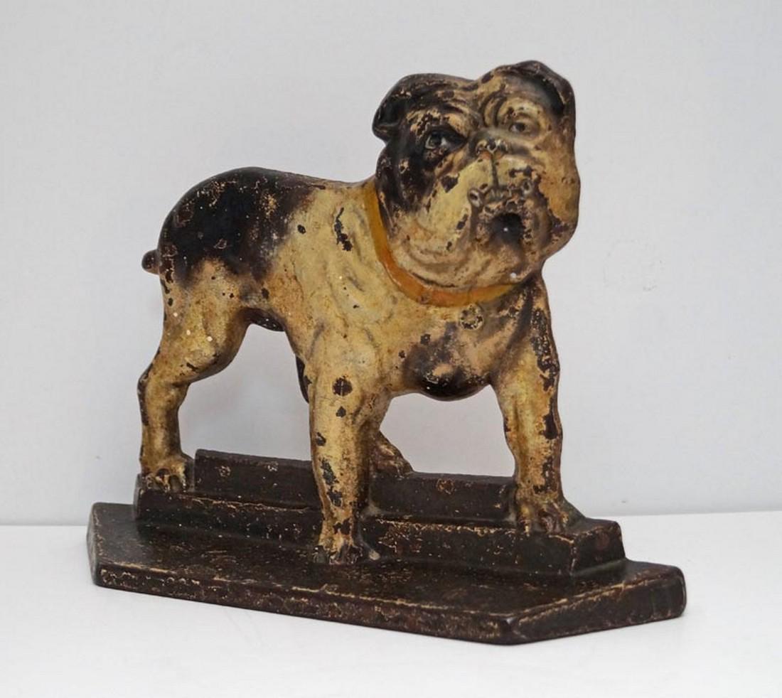 Standing English Bulldog Dog Cast Iron Doorstop: Title: Standing English Bulldog Dog Cast Iron Doorstop Date/Period: Circa 1920's-30's. Dimension: 8 3/4" tall x 10 3/8" wide. Additional Information: Unique profile casting of an English Bulldog stand