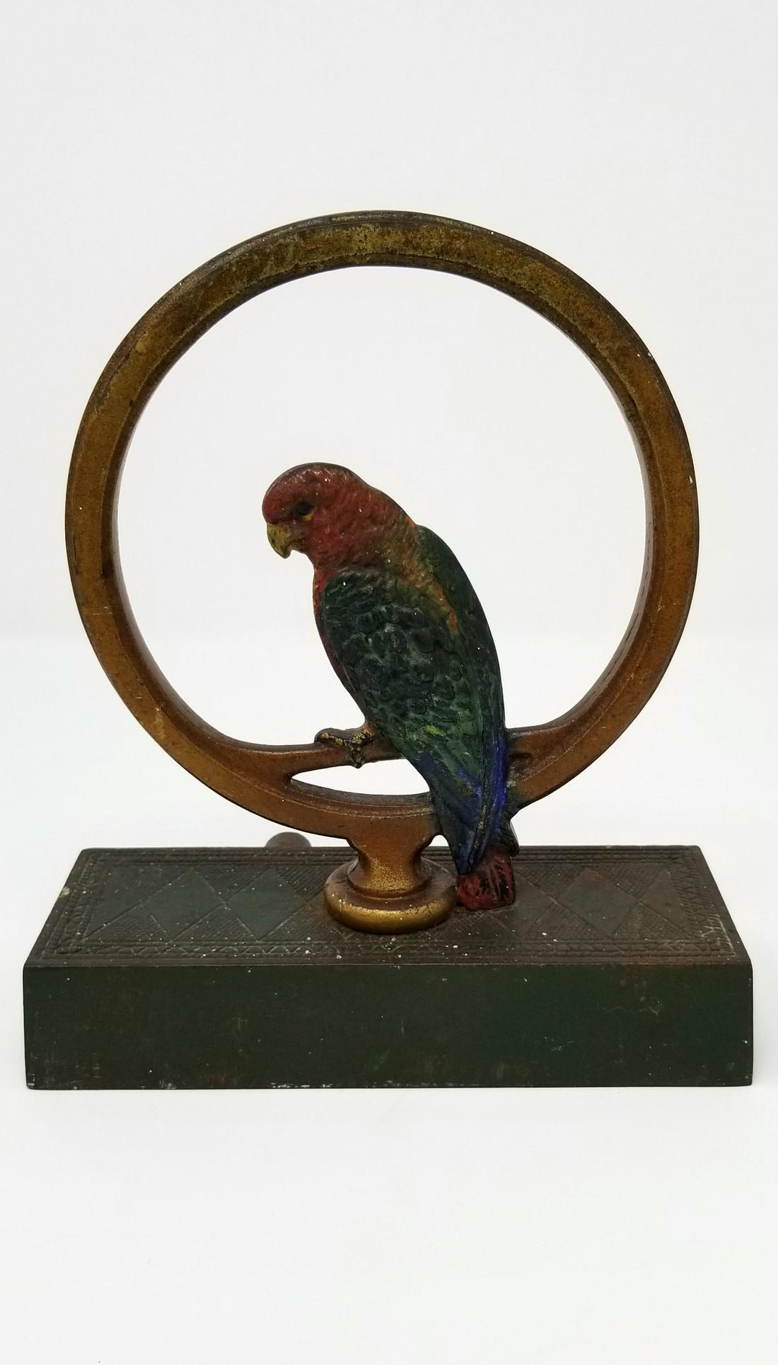 Parrot  in ring doorstop in very good original paint (1 of 3)