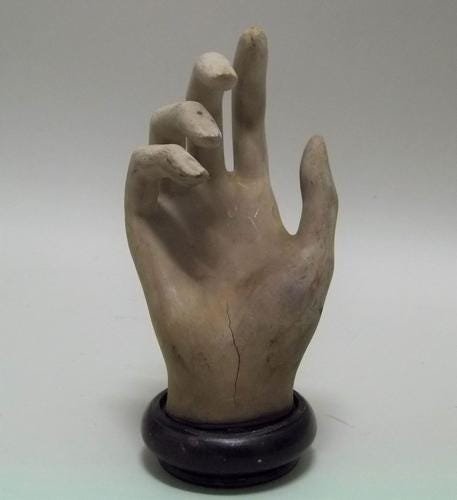 Carved Wood Hand: Title: Carved Wood Hand Date/Period: early to mid 20th c Origin: American Dimensions: Hand is 6" long, 3 1/2" wide, with mounting, it stands 7" tall. Provenance/Additional Info:Fingers are bent, formi