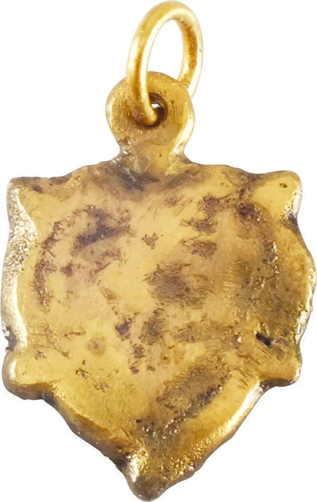 FINE VIKING HEART NECKLACE C.900-1050 AD: Slightly under 7/8â€ height, with nubs at the sixth points. Raised rounded edge. Central motif obscured by wear in its working life. Made by the open face mold technique. The form of t