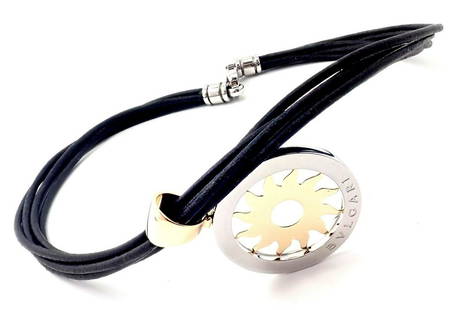 Bulgari Tondo Sun 18k Yellow Gold Steel Pendant Leather: Bulgari Tondo Sun 18k Yellow Gold Steel Pendant Leather Cord Necklace Bulgari Tondo Sun 18k Yellow Gold Steel Pendant Leather Cord Necklace Product Description About This Piece: Metal: 18k