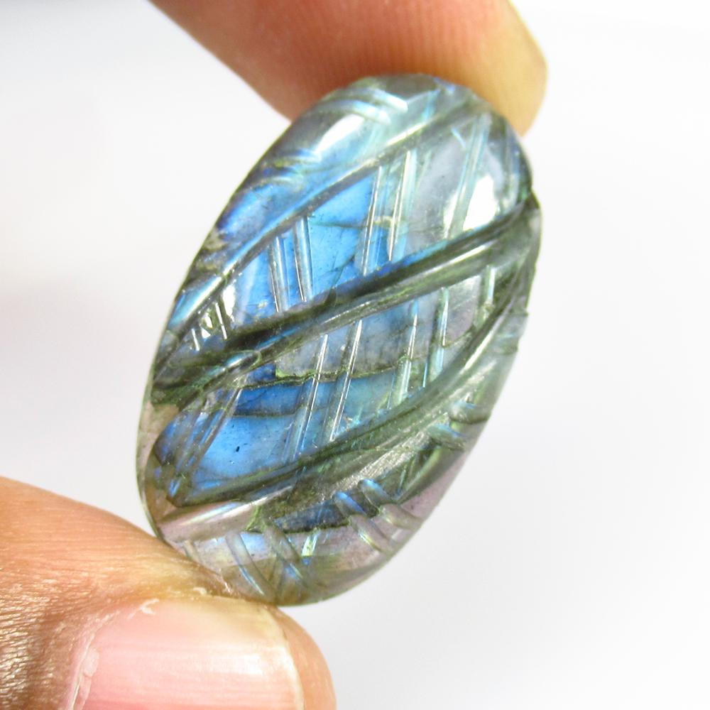 32.07 Ct Natural Labradorite Oval Cab: No Reserve! Title: 32.07 Ct Natural Labradorite Oval Cab Stone Clarity: Opaque Gemstone: Natural labradorite Carat Weight: 32.07 Dimensions: 27.00 x 16.40 x 8.00 mm Additional Information: Oval Caboch