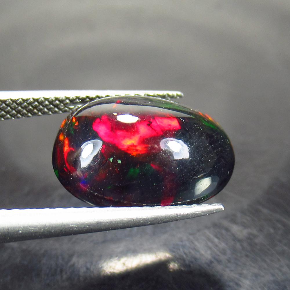 4.25 Ct Natural Ethiopian Black Fire Opal Oval Cab (1 of 2)