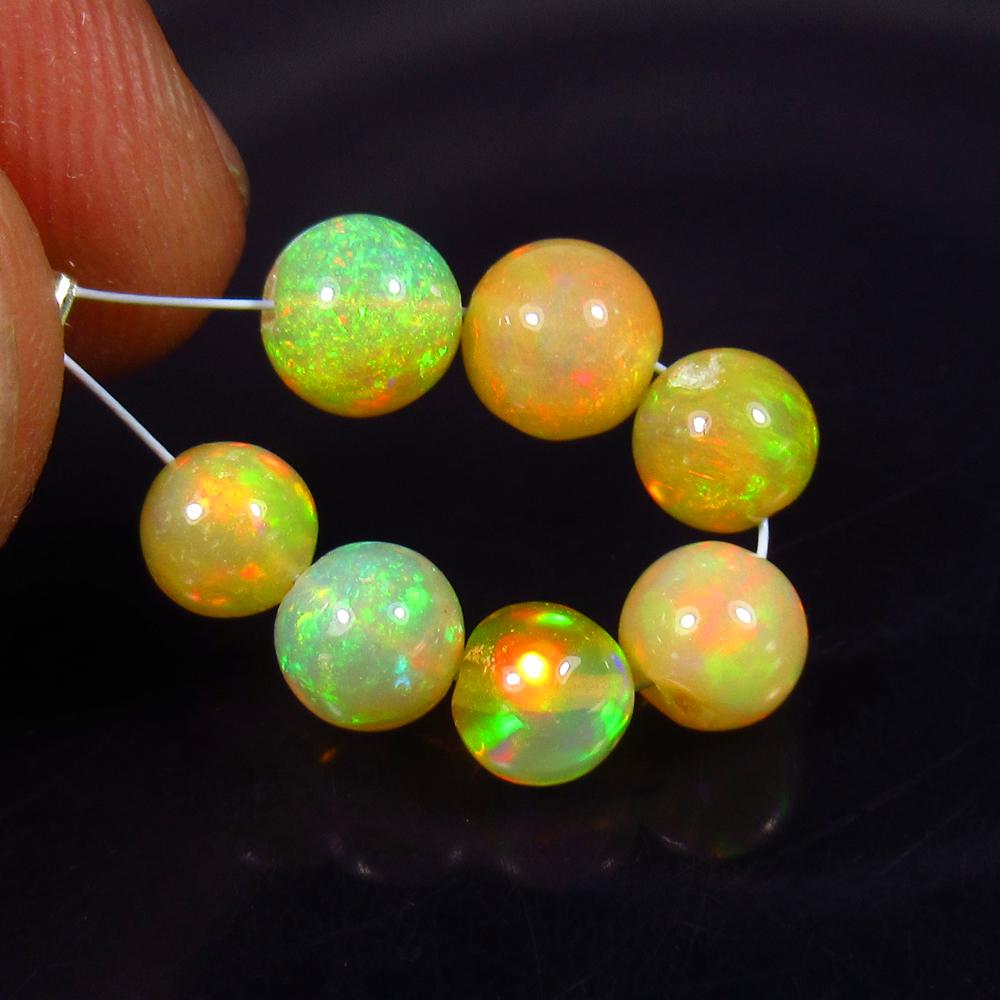 4.56 Ct Natural 7 Drilled Multi-Color Fire Opal Ball (1 of 2)