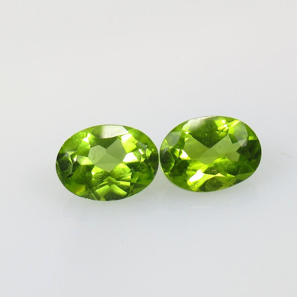 2.60 Ct Natural Pakistan Peridot Oval Pair: No Reserve! Title: 2.60 Ct Natural Pakistan Peridot Oval Pair Stone Clarity: VVS Gemstone: Natural Peridot Carat Weight: 2.60 Dimensions: 7.90 x 5.80 x 3.80 mm / 2 PC's Additional Information: Top Cla