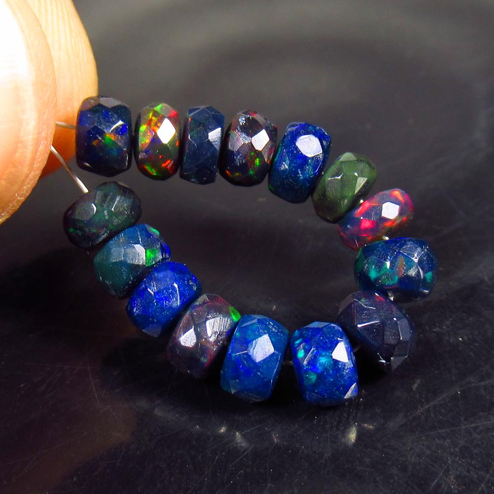 5.48 Ct Natural 15 Drilled Faceted Black Opal Beads: No Reserve! Title: 5.48 Ct Natural 15 Drilled Faceted Black Opal Beads Stone Clarity: Translucent Gemstone: Natural Faceted Black Opal Beads Carat Weight: 5.48 Dimensions: 4.60 to 4.90 mm / 15 PC's Ad
