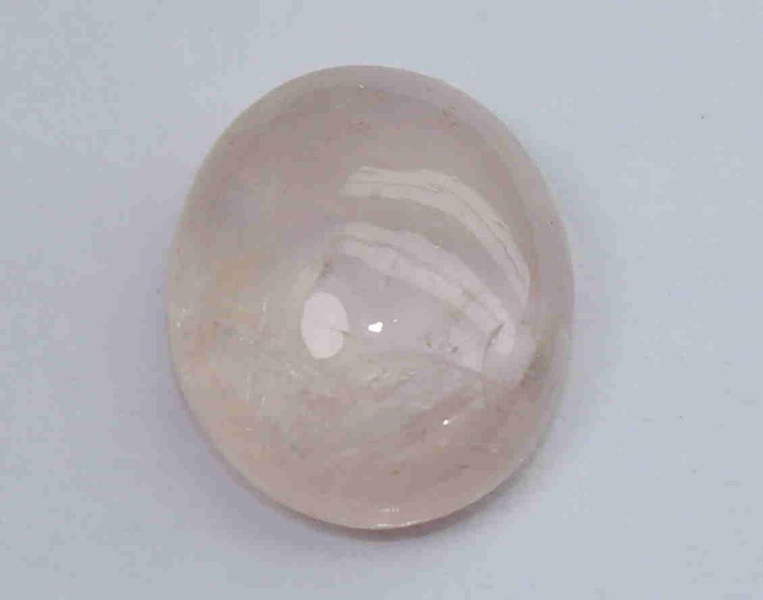2.34 Cts Natural Morganite: No Reserve! Title: 2.34 Cts Natural Morganite Additional Information: Gemstone: Natural Morganite Origin: Africa Weight: 2.34 Carats Measurements: 10x8x3.9 mm Shape : Oval Cabochon Colour: Pink Peach 