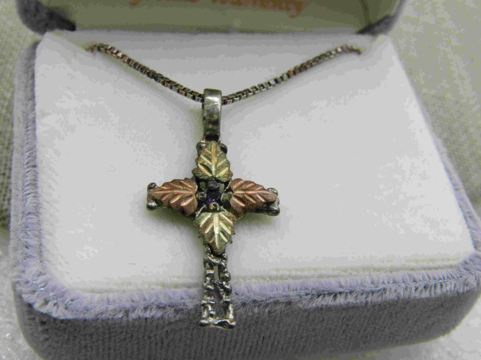 Vintage Sterling Southwestern Black Hills Gold Cross: Vintage Sterling Southwestern Black Hills Gold Cross Necklace, Amethyst center stone, 18", Gold Overlay in rose and yellow gold- leaves at the center of the cross with diamond cut accents and a center