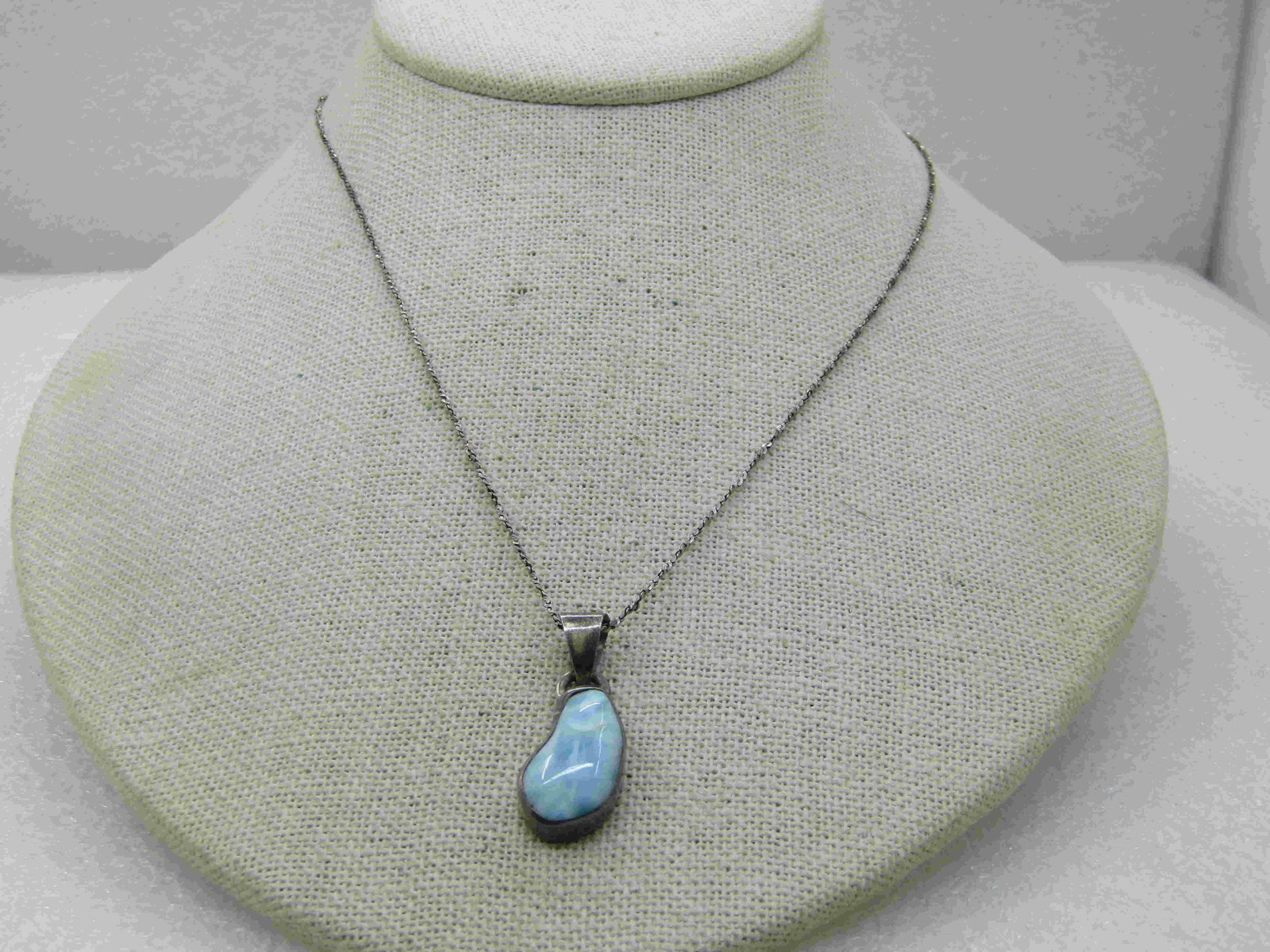 Vintage Sterling Southwestern Larimar Necklace, 16": Vintage Sterling Southwestern Larimar Necklace, 16" twisted C-link chain. Weight is appx. 5.86 gr. The pendant has a wide swing bail making it easy to switch the chain depending on how it is wanted to