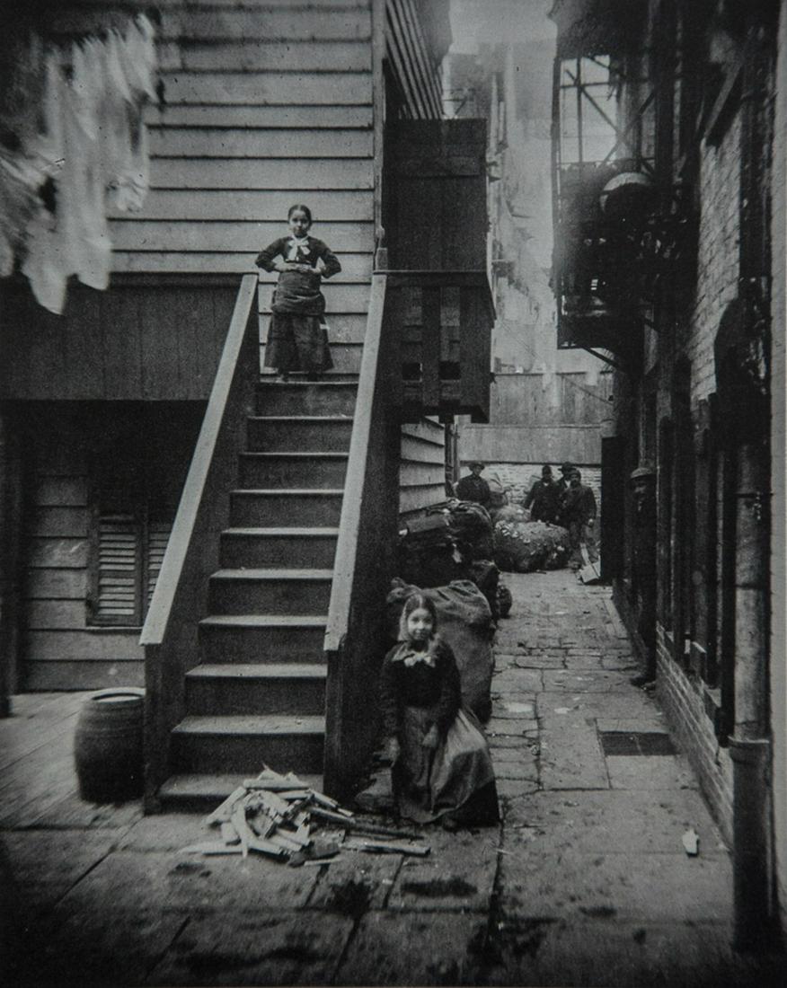 JACOB RIIS - Baxter Street Alley, Mulberry Bend, 1888: Artist: Jacob Riis Title: Baxter Street Alley in Mulberry Bend, N.Y. 1888 Medium: Rotogravure, 1964, Netherlands Dimensions: 6.5x8" Description: Heat Wax Mounted on 11x14" Conservation Board Artist Bi