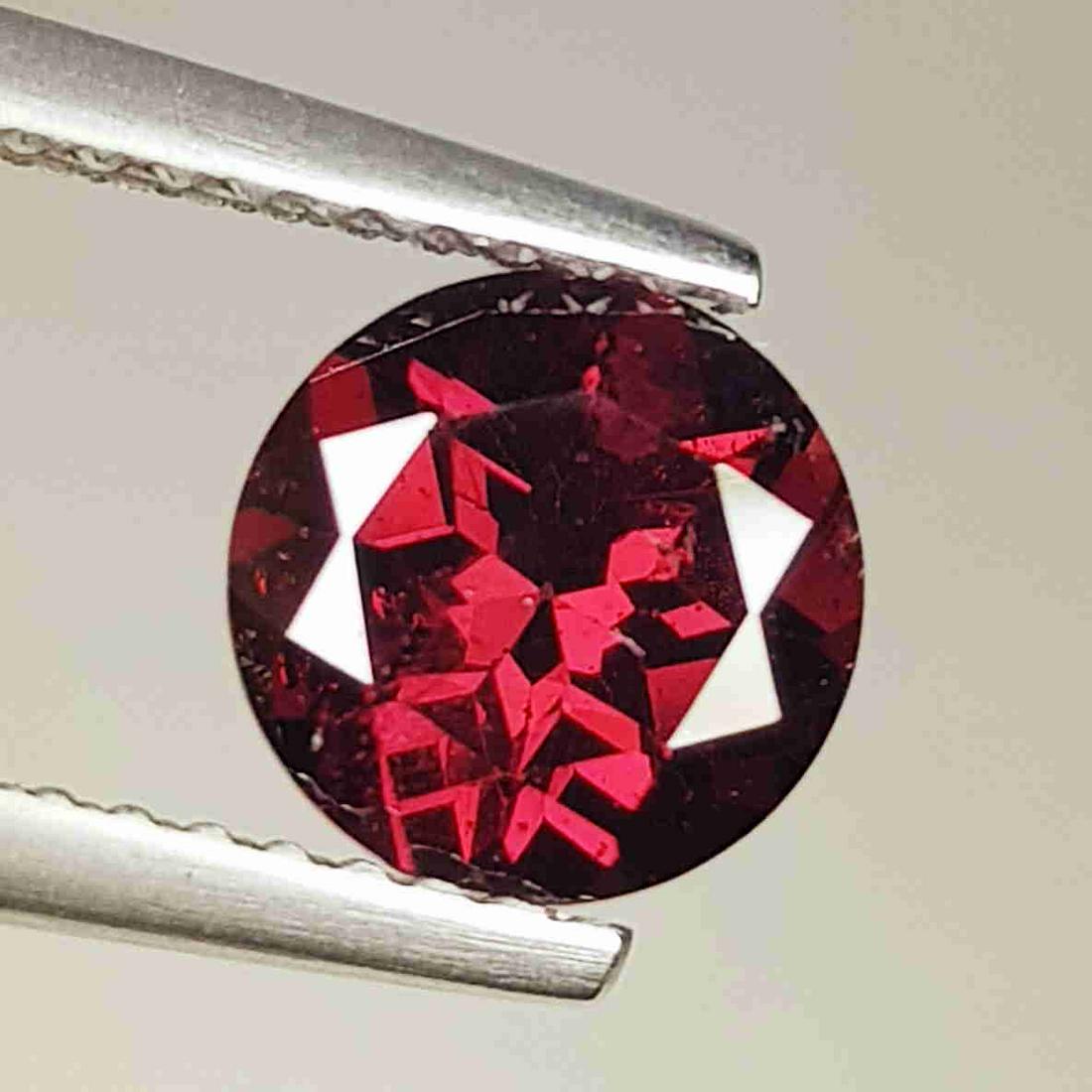 Natural Rhodolite Garnet Round Cut 1.66 ct: No Reserve! Title: Natural Rhodolite Garnet Round Cut 1.66 ct Color/Clarity:VVS - VS Carat Weights: 1.66 Size/Dimensions: 7.00 x 7.00 x 4.40 Additional Information:Round - Burma Shipping: Domestic: F