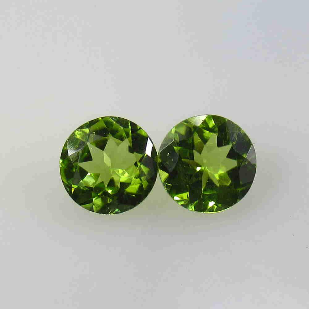2.43 Ctw Natural Pakistan Peridot Round Pair: No Reserve! Title: 2.43 Ctw Natural Pakistan Peridot Round Pair Stone Clarity: VVS Gemstone: Peridot Size/ Dimensions: 2.43 Carat Weights: 7.00 x 7.00 x 3.60 mm / 2 PC's Additional Info: Top Class Ful