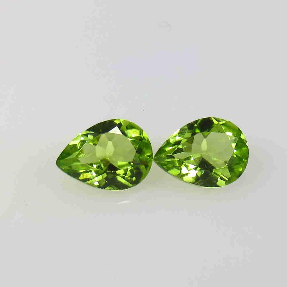 2.00 Ctw Natural Pakistan Peridot Pear Pair: No Reserve! Title: 2.00 Ctw Natural Pakistan Peridot Pear Pair Stone Clarity: VVS Gemstone: Peridot Size/ Dimensions: 2 Carat Weights: 8.00 x 6.00 x 3.40 mm / 2 PC's Additional Info: Top Class Full Lu