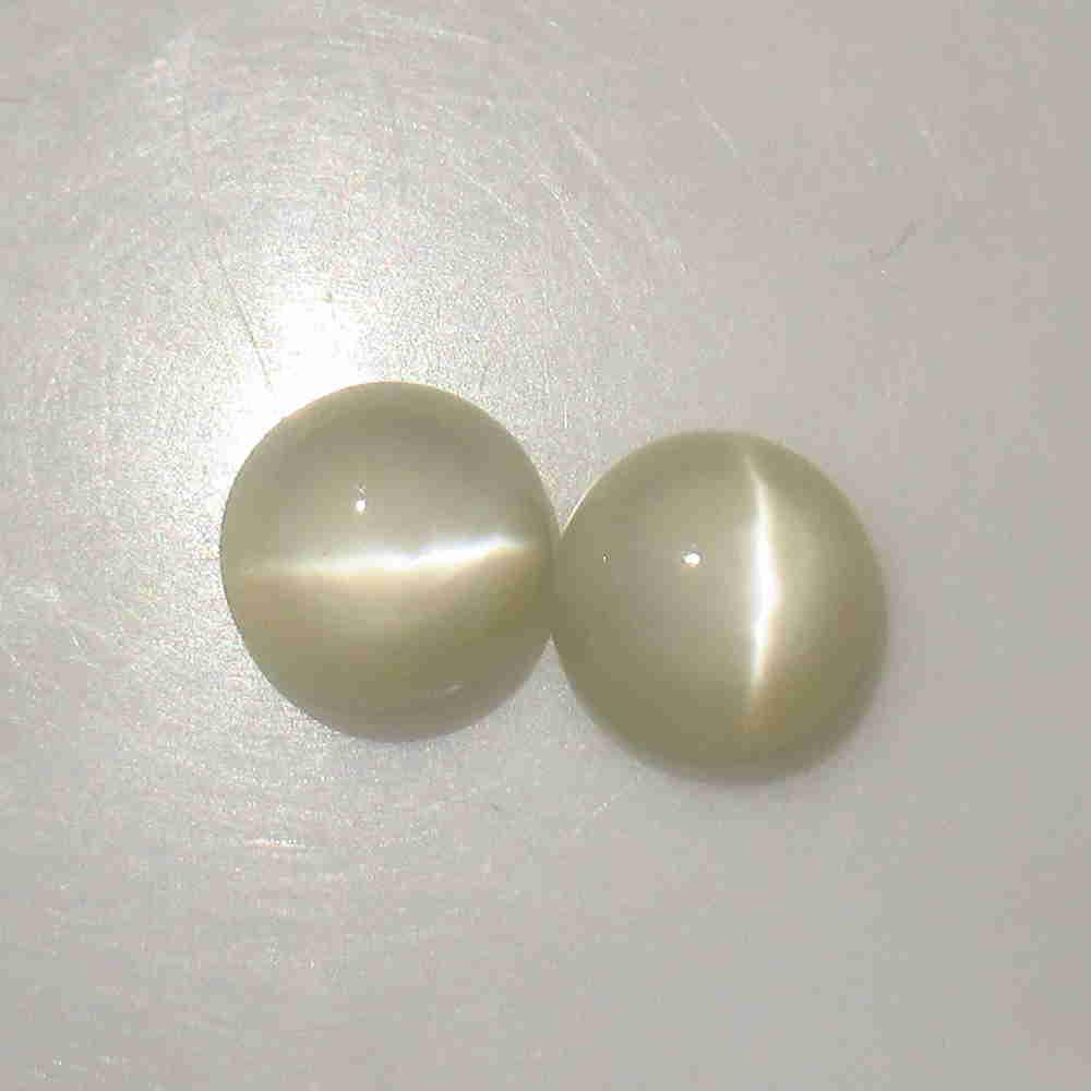 7.15 Ctw Natural Moonstone Round Pair: No Reserve! Title: 7.15 Ctw Natural Moonstone Round Pair Stone Clarity: Semi-Transparent Gemstone: Natural Moonstone Size/ Dimensions: 7.15 Carat Weights: 9.20 x 9.20 x 6.10 mm / 2 PC's Additional Inf
