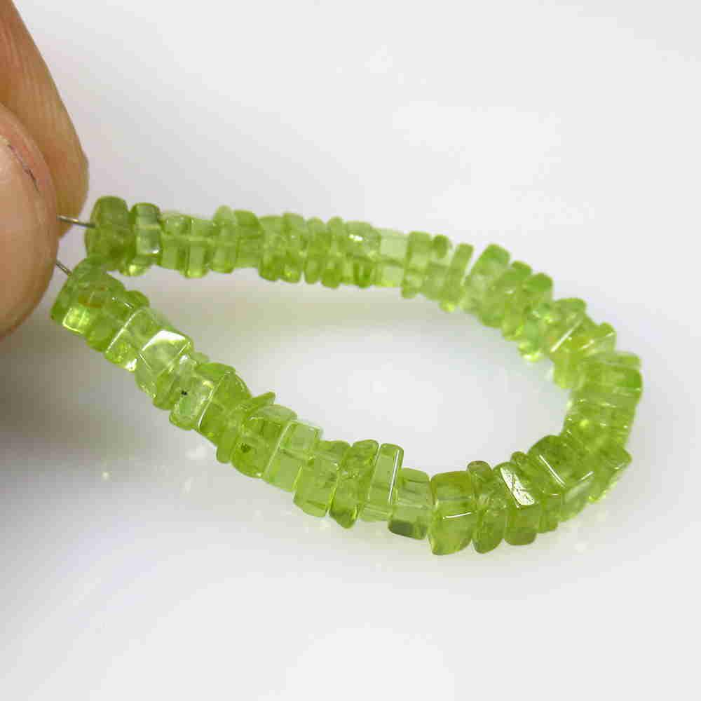 15.33 Ctw Natural 46 Drilled Peridot Square Beads: No Reserve! Title: 15.33 Ctw Natural 46 Drilled Peridot Square Beads Stone Clarity: Transparent Gemstone: Peridot Beads Size/ Dimensions: 15.33 Carat Weights: 3.0x3.0 to 4.2x4.2 mm / 46 PC's Additiona