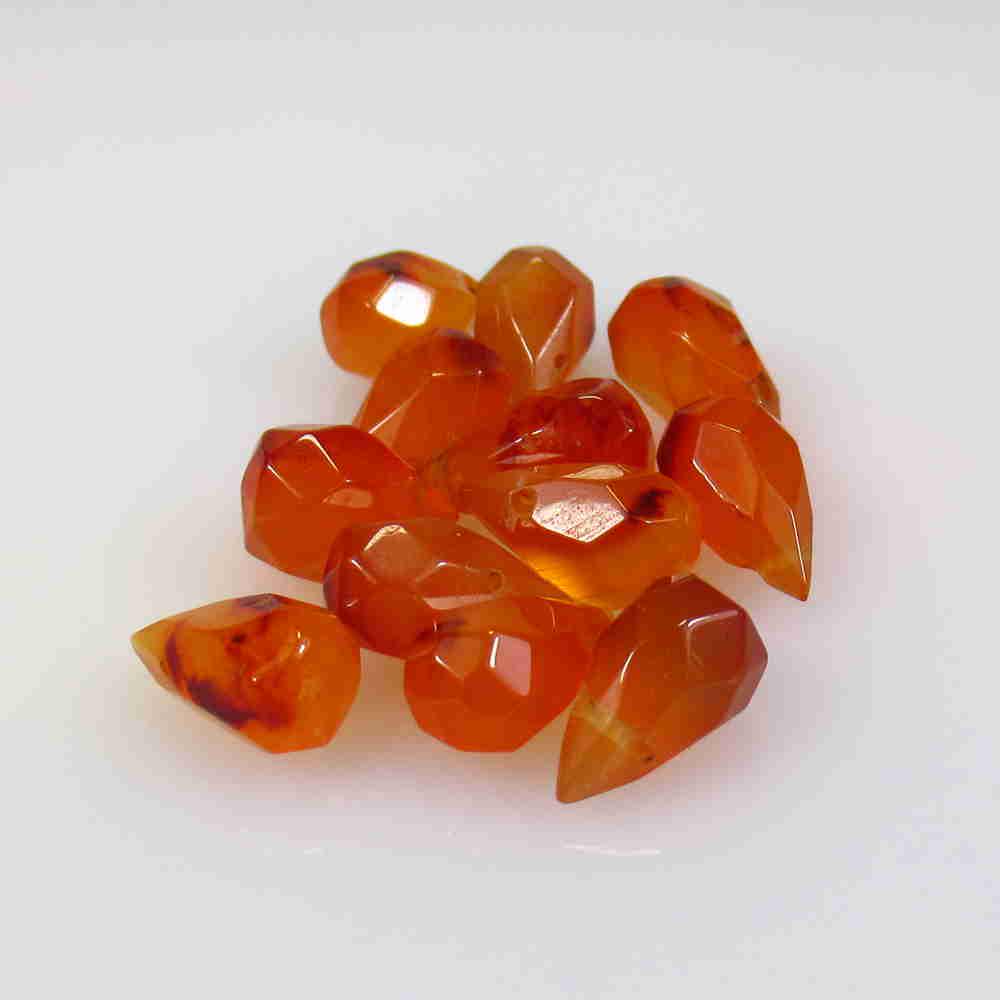 19.67 Ctw Natural 12 Drilled Orange Carnelian Pear: No Reserve! Title: 19.67 Ctw Natural 12 Drilled Orange Carnelian Pear Beads Stone Clarity: Semi-Transparent Gemstone: Natural Carnelian Beads Size/ Dimensions: 19.67 Carat Weights: 8.7x5.3 - 10.5x5.7 