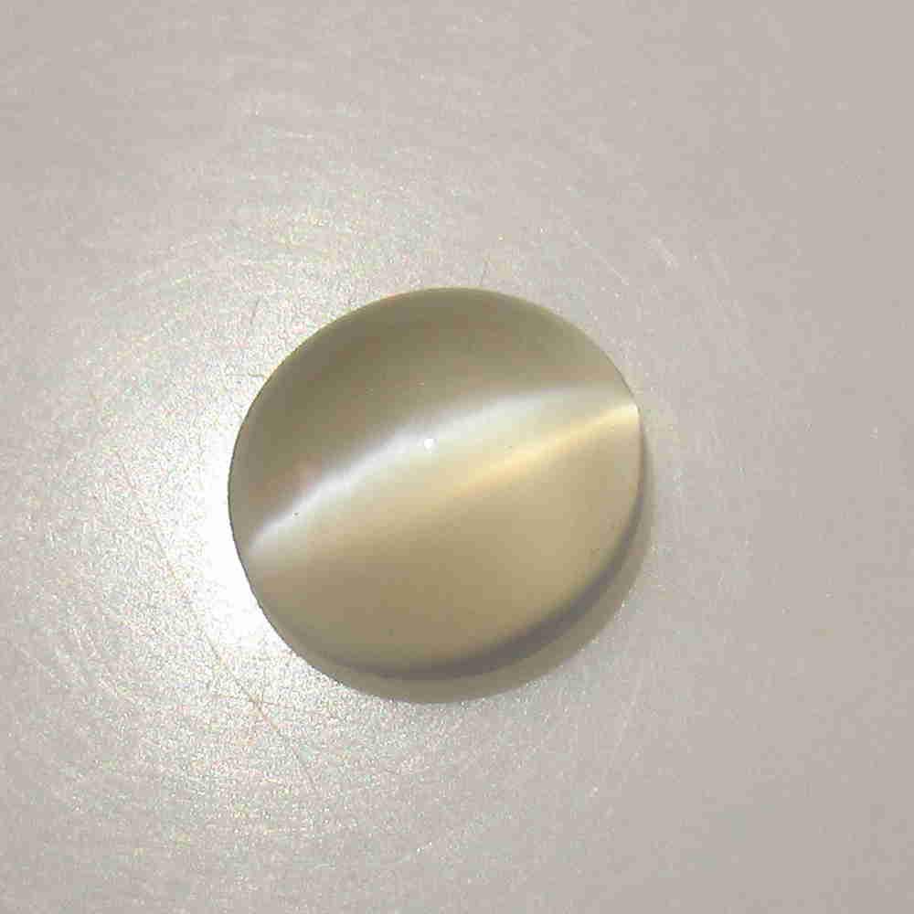 6.74 Ctw Natural Moonstone Oval Cab: No Reserve! Title: 6.74 Ctw Natural Moonstone Oval Cab Stone Clarity: Semi-Transparent Gemstone: Moonstone Size/ Dimensions: 6.74 Carat Weights: 12.90 x 11.70 x 6.40 mm Additional Info: Nice Oval Cabo
