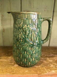 RARE 1916 GREEN MCCOY WILLOW PITCHER YELLOWARE: Title: RARE 1916 GREEN MCCOY WILLOW PITCHER YELLOWARE Date/Period: 1916Dimensions: Approx 9" high by 7" wide to end of handleMaterials: StonewareAdditional Information: This is very hard to find