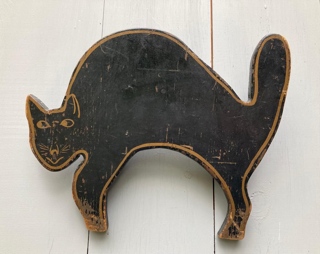 C1900 Black Cat Folk Art: Title: C1900 Black Cat Folk Art Dimension: 13 1/4” long. 10 3/4” high. 3/4” thick pine. Additional Information: Original paint—black with gold. No cracks or repairs. Shipping: 