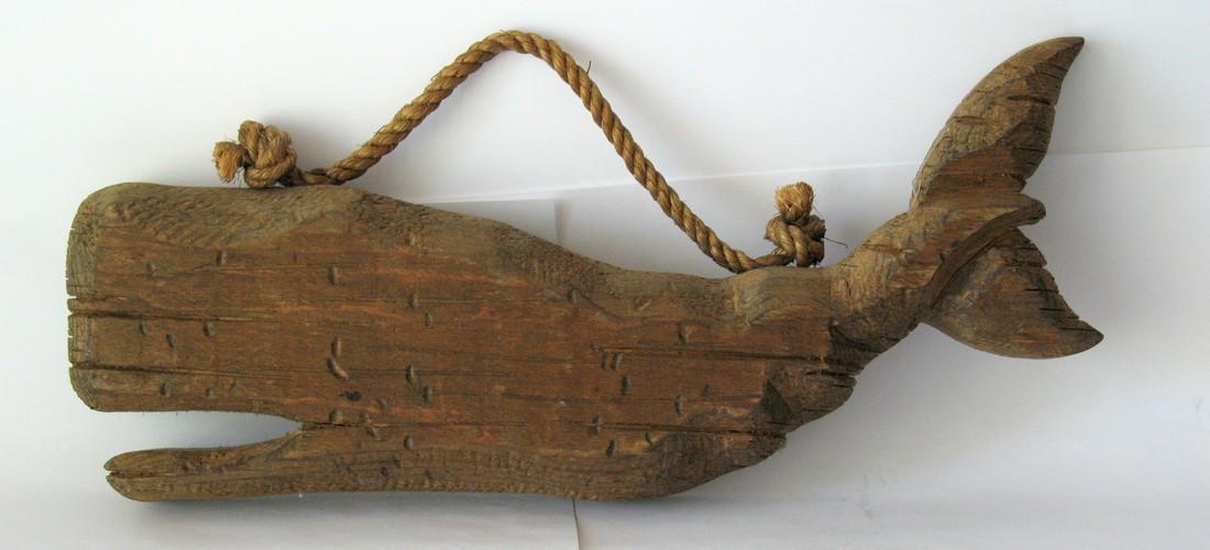 Vintage folk art whale carving.: Title: Vintage folk art whale carving. Provenance/Additional Info: Nice vintage wood wall carving of a Sperm whale. Dimensions: 13 1/2" x 4" x 1 1/2" thick Date/Period: 1960's Shipping: Domestic: Flat