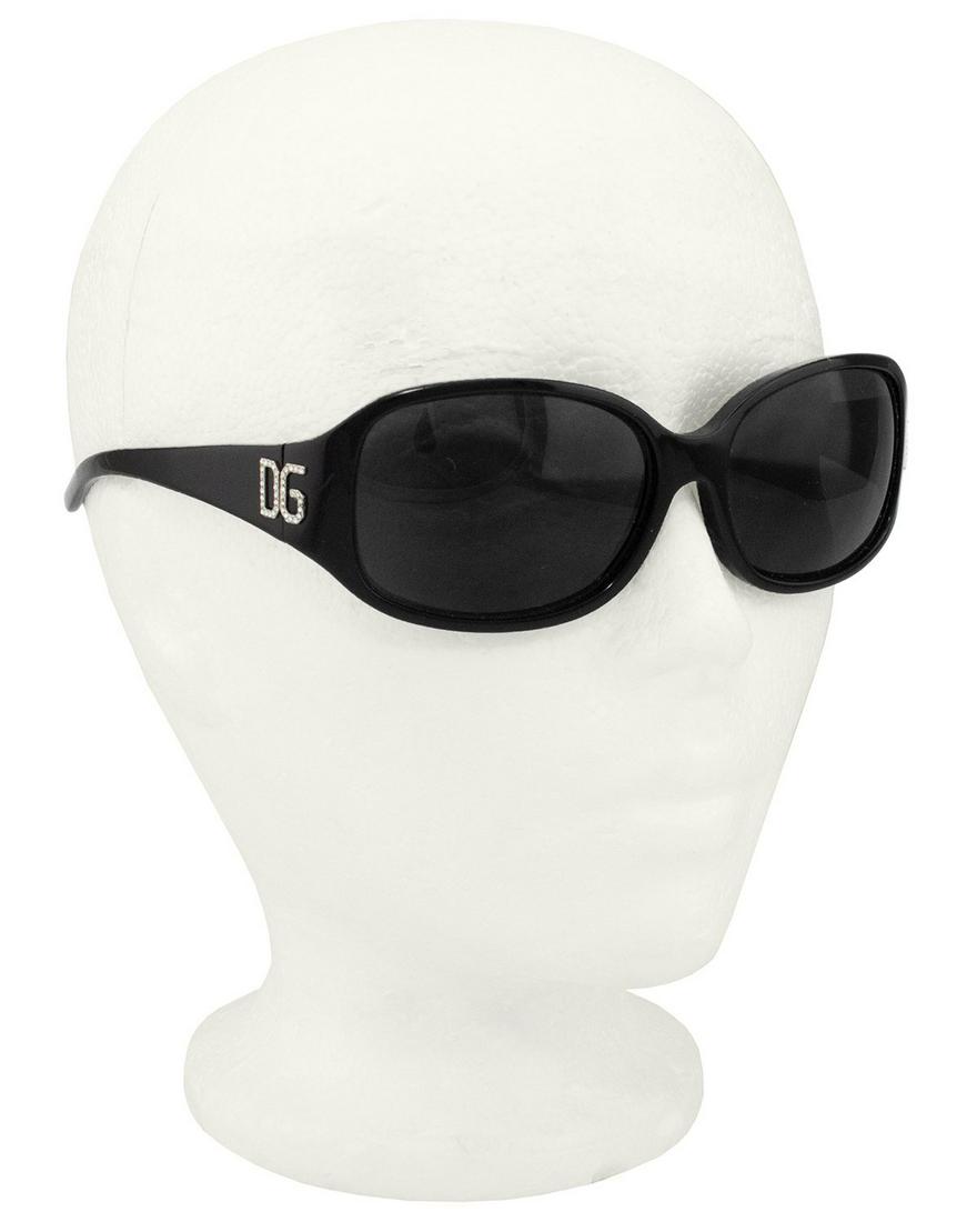 Dolce and Gabbana 2000s Black Sunglasses: Brand: Dolce and Gabbana Title: Dolce and Gabbana 2000s Black Sunglasses Additional Information: Dolce and Gabbana sunglasses from the early 2000s. Black with black gradient lenses. Silver metal DG lo