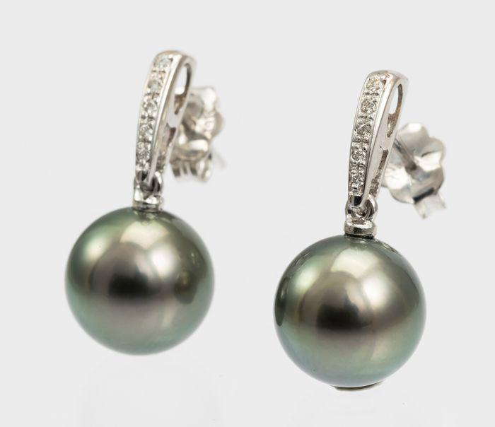 10x11mm Round Bright Tahitian Pearls - 14 kt. White: Title: 10x11mm Round Bright Tahitian Pearls - 14 kt. White gold - Earrings - 0.08 ct Description: Classic Elegance ! Produced by the Pinctada Margaritifera Oyster in the tropical lagoons of French Pol