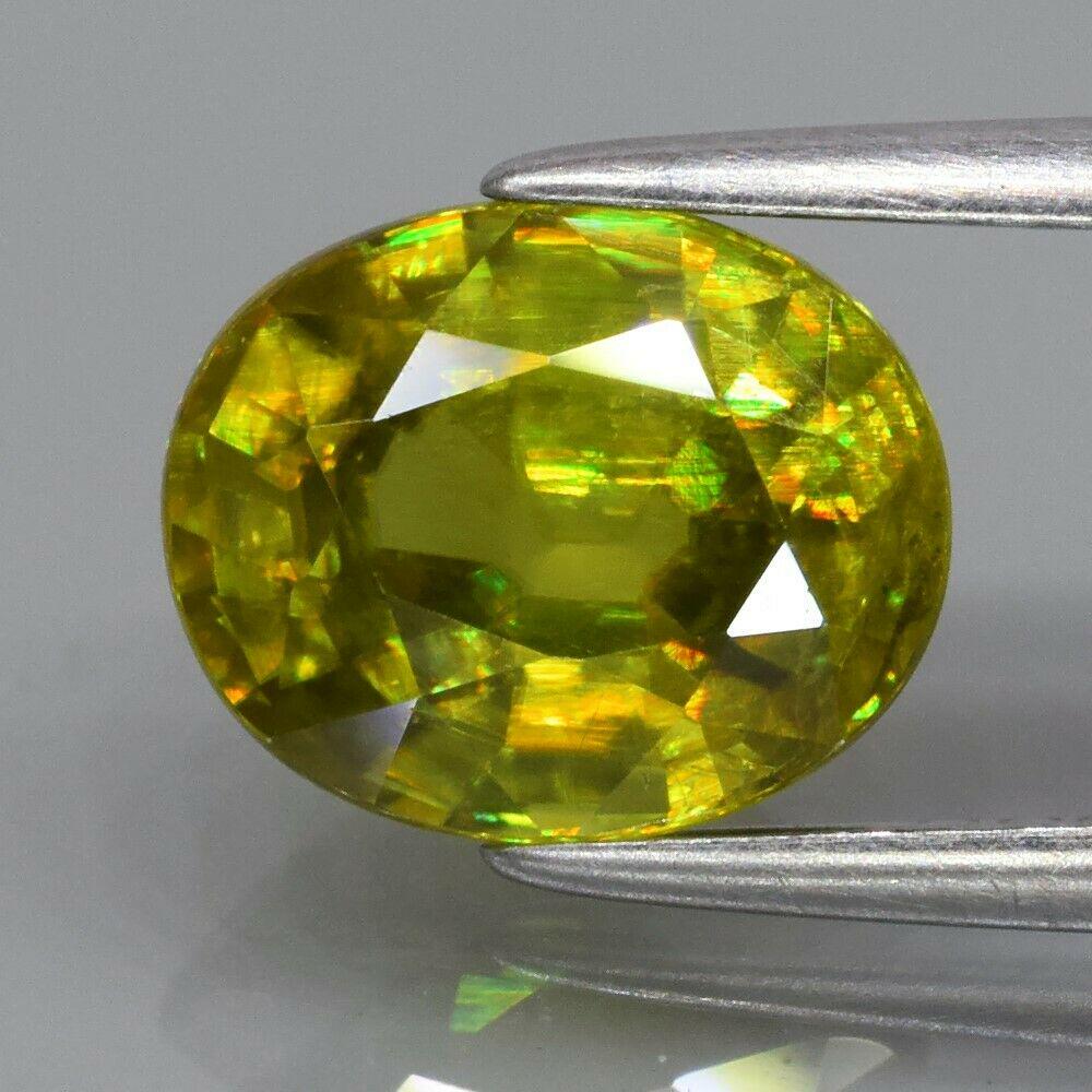 2,09 ct Natural Sphene( Rainbow Spark Under Sun Light) (1 of 2)