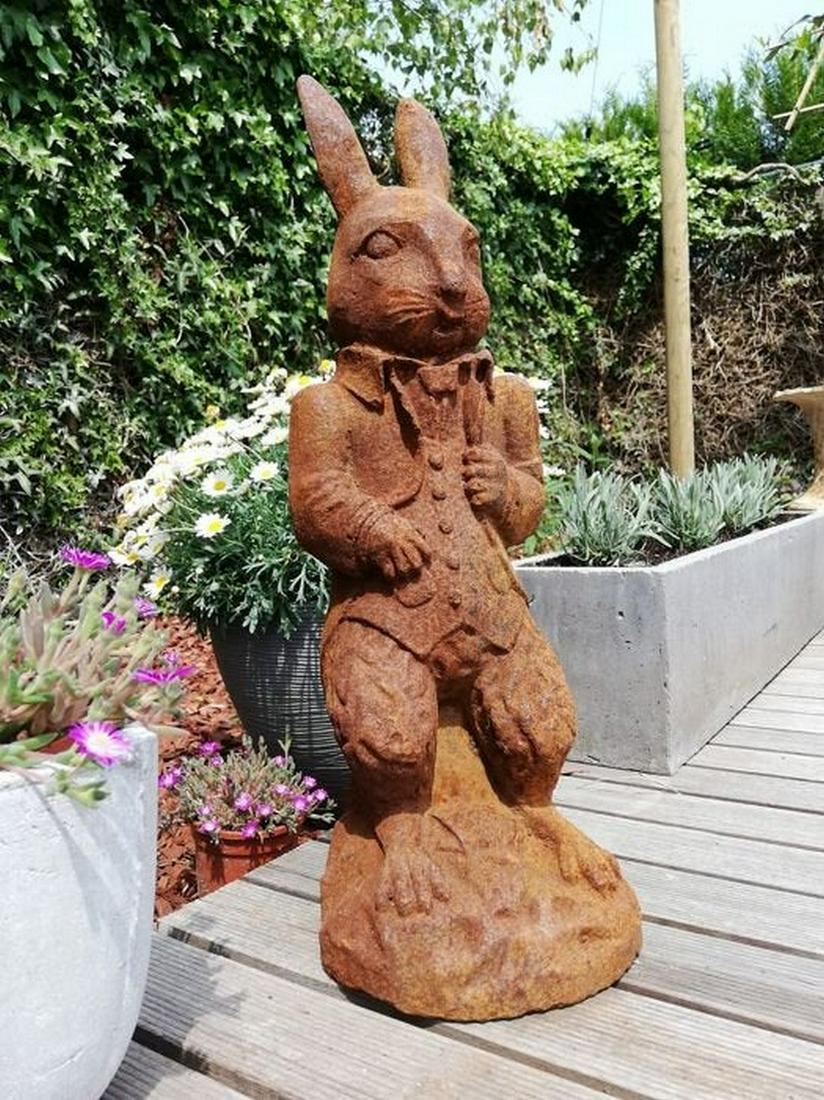 Antique garden sculpture of a standing Rabbit in suit (1 of 8)