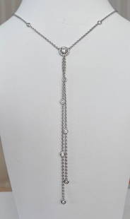 18 kt. White gold Necklace with 0.72 ct Diamonds: Offered in good condition, 18 kt white gold necklace, set with 28 pieces of brilliant cut diamonds of approx. 0.42 ct G/VS and a brilliant cut diamond of approx. 0.30 ct, quality H/VS. Grade of