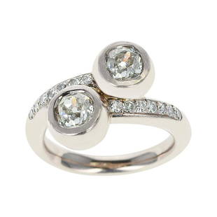 0.85 Carat Each Two Round Diamonds Toi Et Moi: A 0.85 ct. each Two Round Diamonds Toi et Moi Ring. Ring Size US 8. Total Weight: 14.40 grams. The approximate color of the diamonds are F/G and the approximate clarity is VS1.; Resizing is