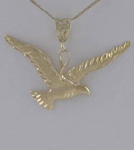 14K YELLOW GOLD FLYING BIRD DIAMOND CUT TEXTURED EAGLE: 14K YELLOW GOLD FLYING BIRD DIAMOND CUT TEXTURED EAGLE PENDANT CHARM 1.37" 33494 14k Yellow Gold (not plated or filled) Bird Pendant! VERY NICE PENDANT! So much nicer in person! Any dark