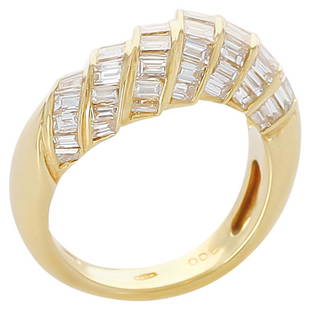 Step-Design Baguette Diamond Ring, 18 Karat Yellow Gold: A step-design baguette diamond ring in 18 Karat Yellow Gold. The Diamonds weigh a total of 2 carats. Ring Size US 5.50. The total weight is 5.80 grams. Metal 18k Gold,Yellow Gold Stone Diamond Stone