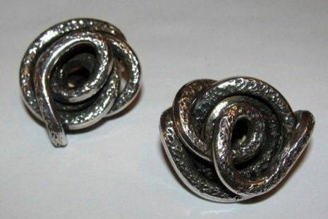 Sterling Silver Spiral Earrings: Gorgeous and substantial... Hand made... Circa 1950's to 1960's... Very 3 dimensional and unique.... Artisan made, but unsigned and one of a kind.... Acid tested for sterling silver .... Each