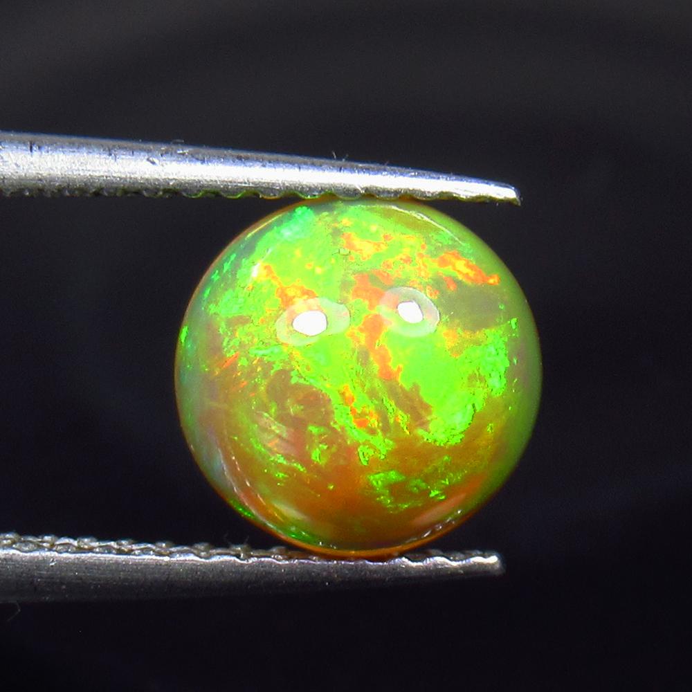 1.19 Ct Natural Ethiopian Multicolor Opal Round Cab (1 of 2)
