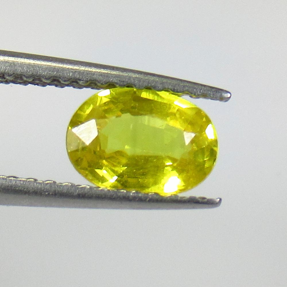 0.98 Ct Natural Ceylon Yellow Sapphire Oval Cut (1 of 2)