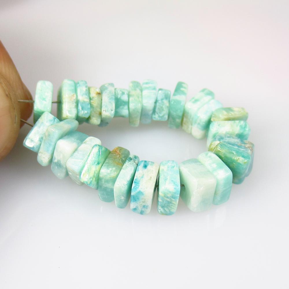 27.20 Ct Natural 28 Drilled Amazonite Square Flat Beads: No Reserve! Title: 27.20 Ct Natural 28 Drilled Amazonite Square Flat Beads Color/Clarity: Transparent Gemstone: Natural Amazonite Beads Carat Weight: 27.20 Size/Dimensions: 5.4x5.8 - 5.9x6.3 mm / 28 P