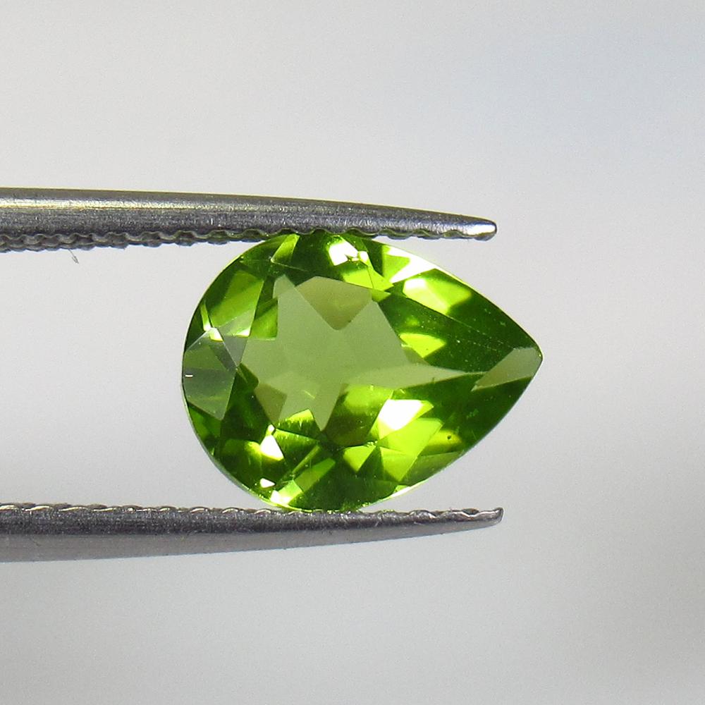 1.70 Ct Natural Peridot Pear Cut: No Reserve! Title: 1.70 Ct Natural Peridot Pear Cut Color/Clarity: VVS Gemstone: Natural Peridot Carat Weight: 1.70 Size/Dimensions: 9.50 x 7.50 x 4.10 mm Additional Information: Top Class Luster / Ex