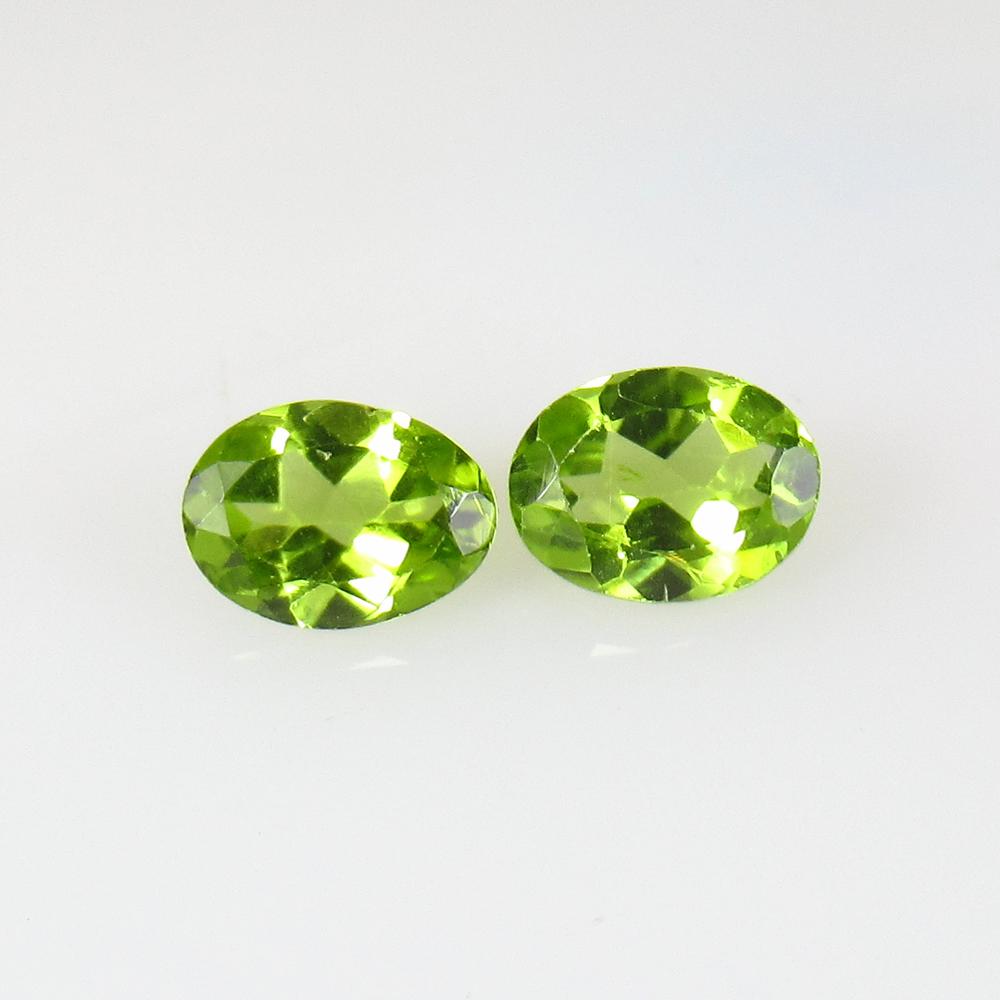 2.40 Ct Natural Pakistan Peridot Oval Pair: No Reserve! Title: 2.40 Ct Natural Pakistan Peridot Oval Pair Color/Clarity: VVS Gemstone: Natural Peridot Carat Weight: 2.4 Size/Dimensions: 7.80 x 6.00 x 3.50 mm / 2 PC's Additional Information: Top