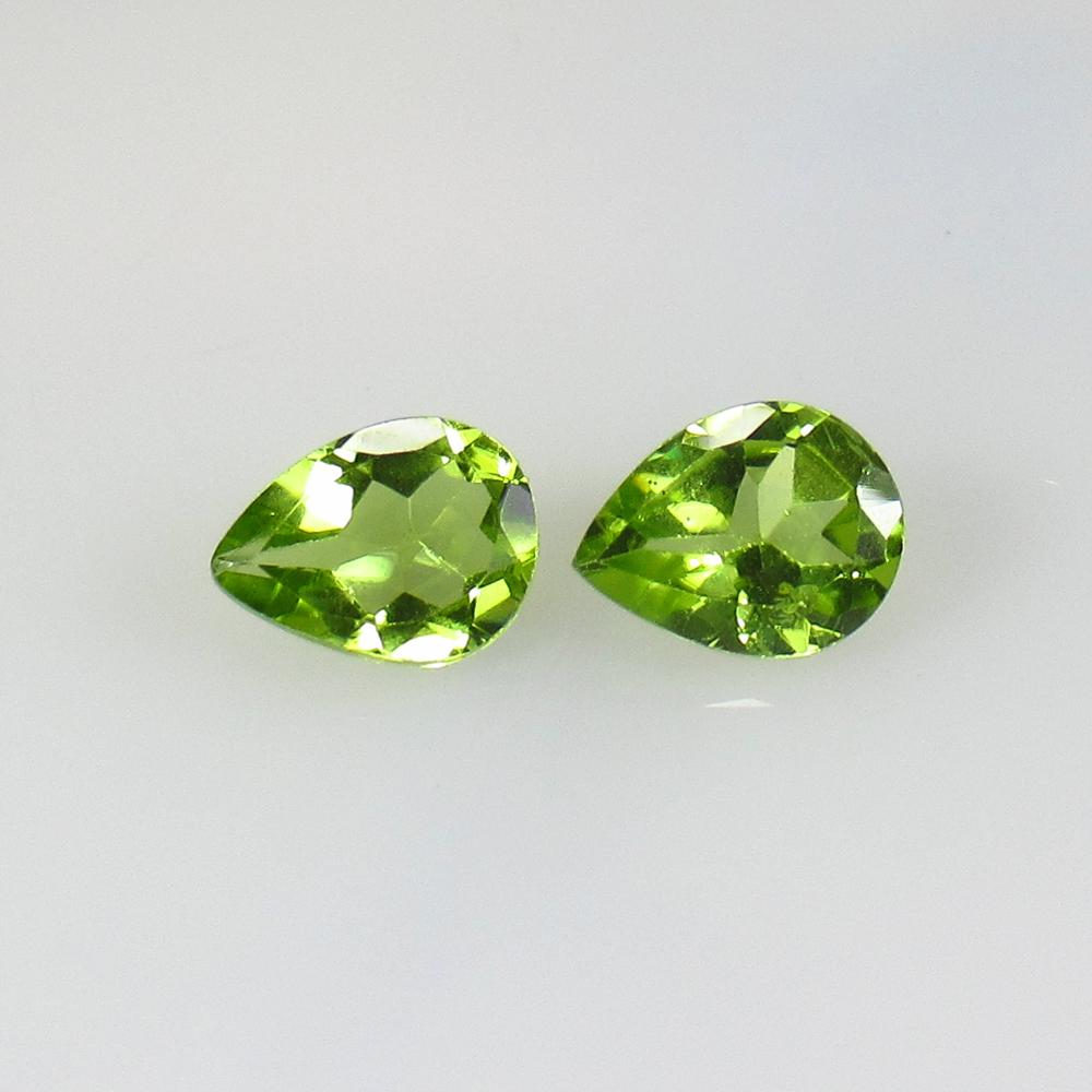 2.00 Ct Natural Pakistan Peridot Pear Pair: No Reserve! Title: 2.00 Ct Natural Pakistan Peridot Pear Pair Color/Clarity: VVS Gemstone: Natural Peridot Carat Weight: 2 Size/Dimensions: 7.60 x 5.80 x 3.30 mm / 2 PC's Additional Information: Top C