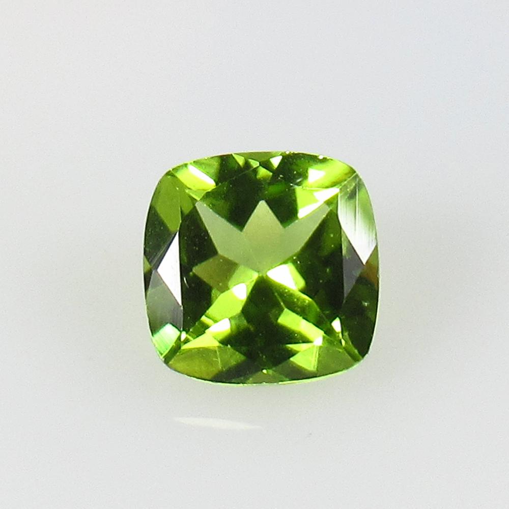 1.55 Ct Natural Peridot Cushion Cut: No Reserve! Title: 1.55 Ct Natural Peridot Cushion Cut Color/Clarity: VVS Gemstone: Natural Peridot Carat Weight: 1.55 Size/Dimensions: 7.10 x 7.10 x 4.20 mm Additional Information: Top Class Luster /