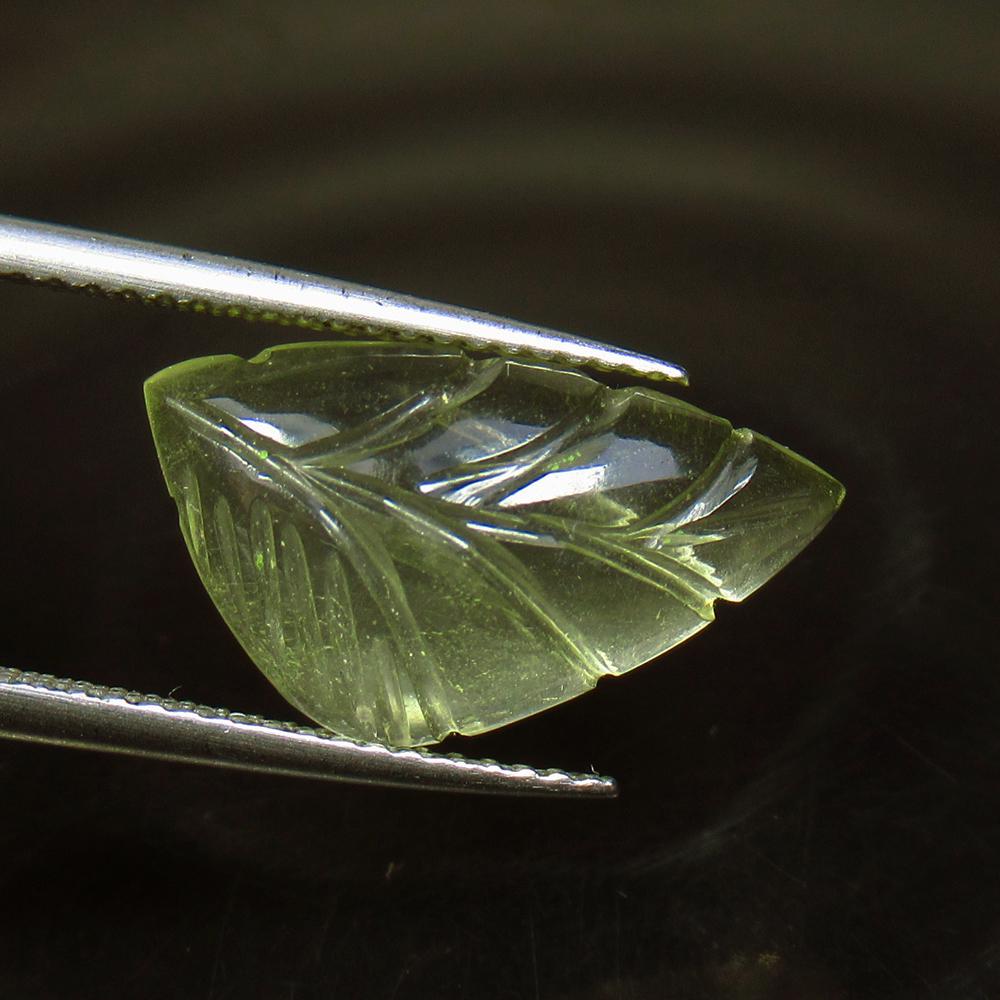 5.66 Ct Natural Lemon Quartz Carving: No Reserve! Title: 5.66 Ct Natural Lemon Quartz Carving Color/Clarity: Transparent Gemstone: Natural Lemon Quartz Carat Weight: 5.66 Size/Dimensions: 17.90 x 10.00 x 5.00 mm Additional Information: Ex